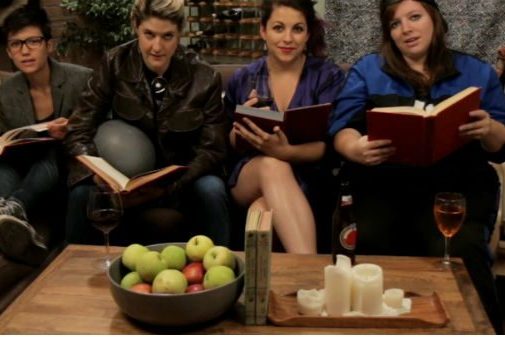 6 women sitting on sofa reading books