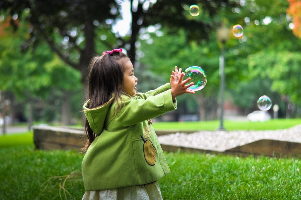 small child playing outside