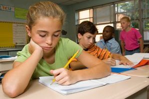 younggirl_atschool_writing_pencil