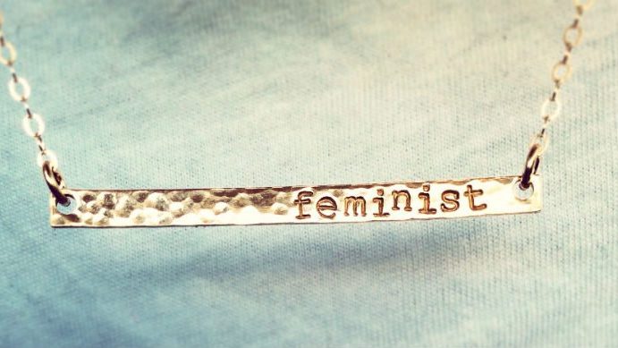 Braclet with writing 'feminist'