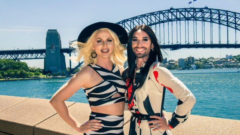 Conchita Wurst and Courtney Act posing infront of Sydney Harbour Bridge