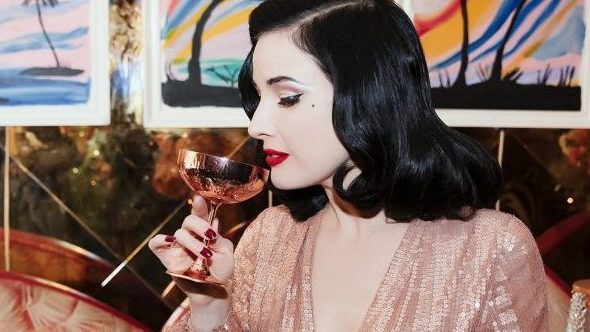 Dita Von Teese drinking cocktail