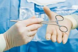 Surgeon passes scissor